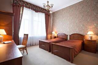 Гостиница Пекин Москва Улучшенный двухместный номер с 2 отдельными кроватями-1